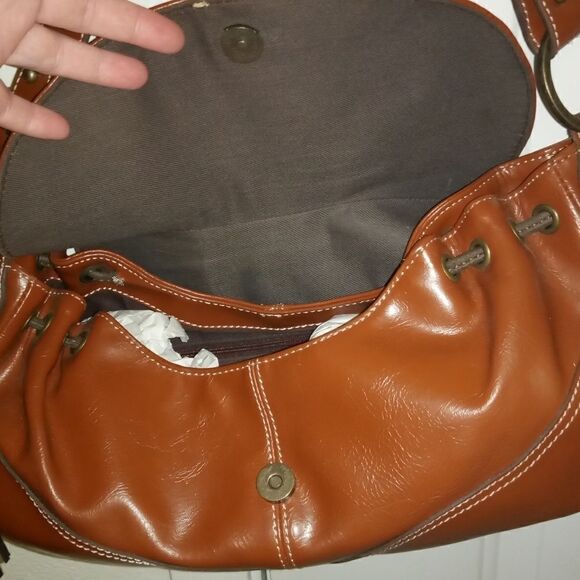 Small tan purse with brown leather tassels - Picture 1 of 7